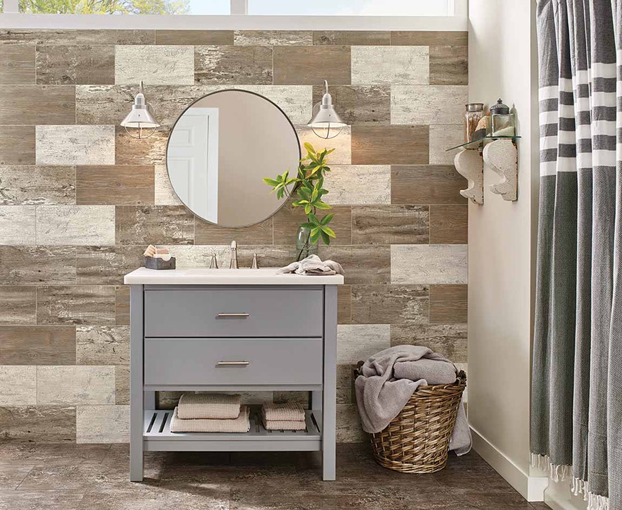 bathroom with tiled walls